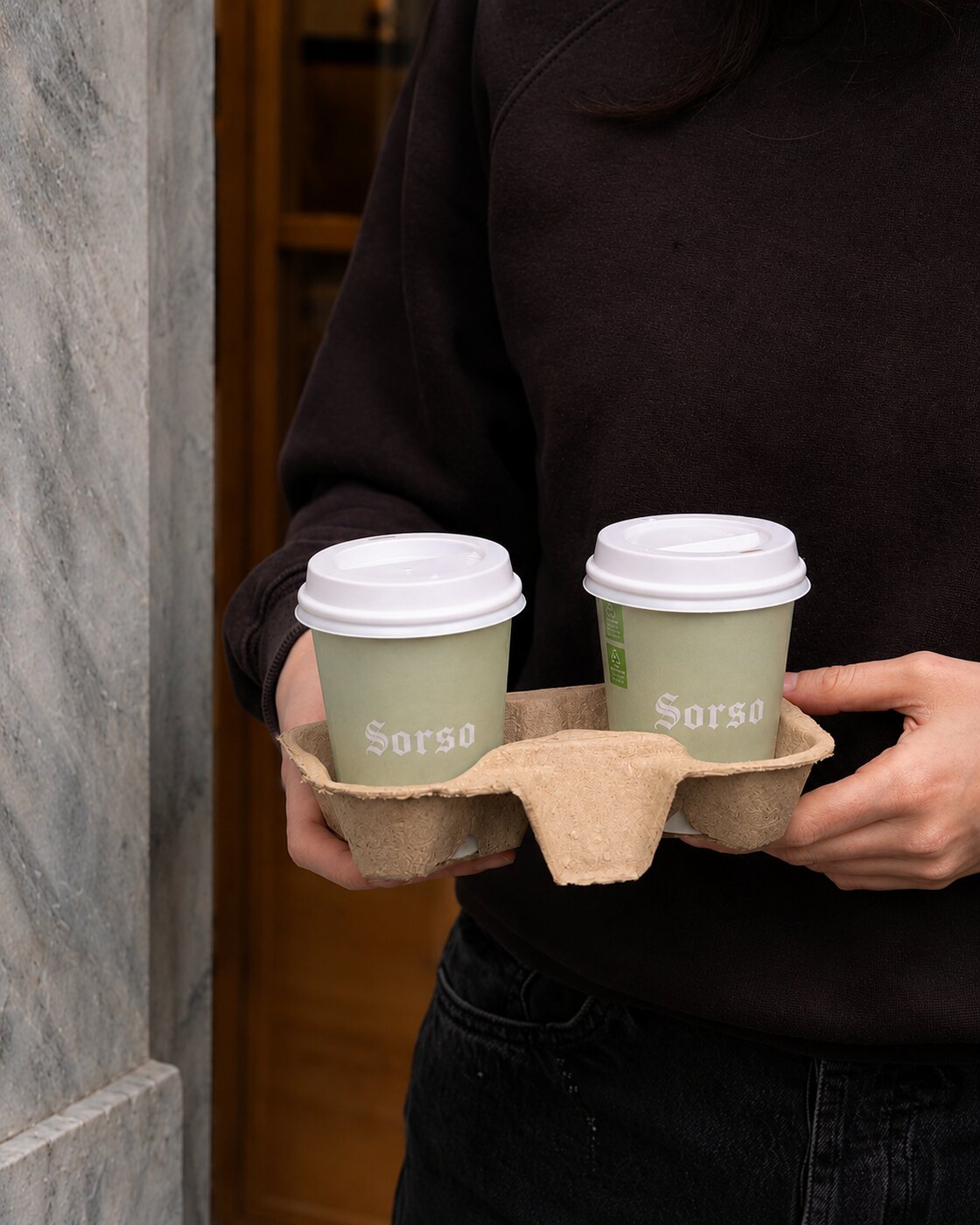 SORSO cups in a carrier, one hand