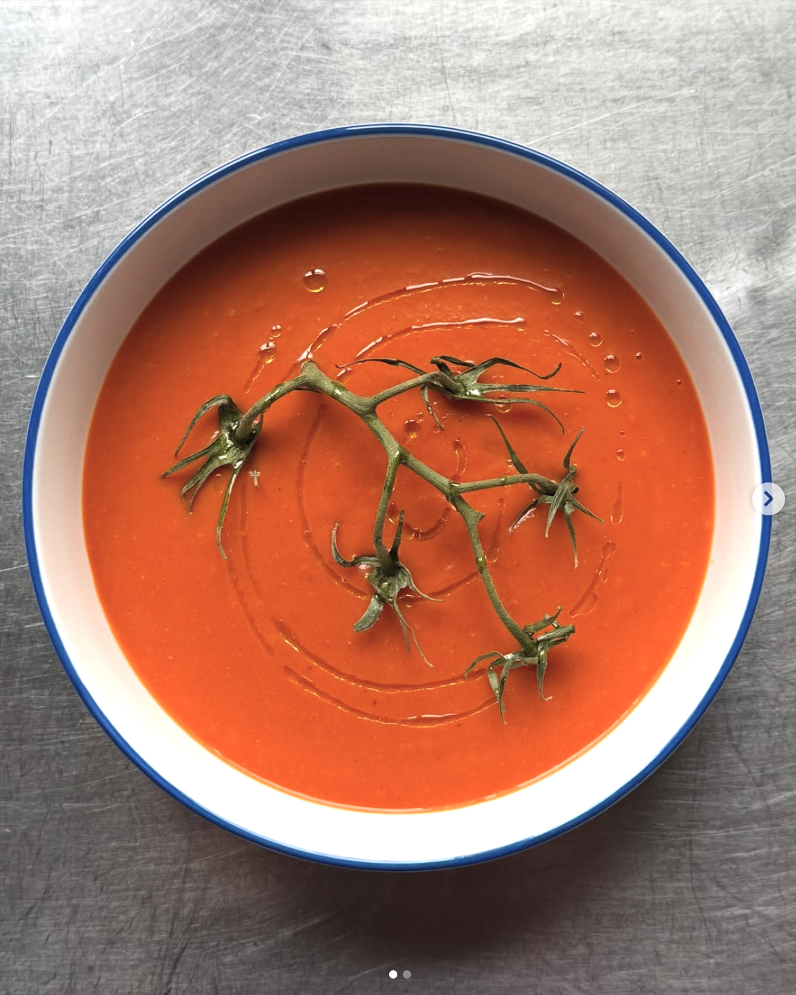 bowl of tomato soup styled overhead